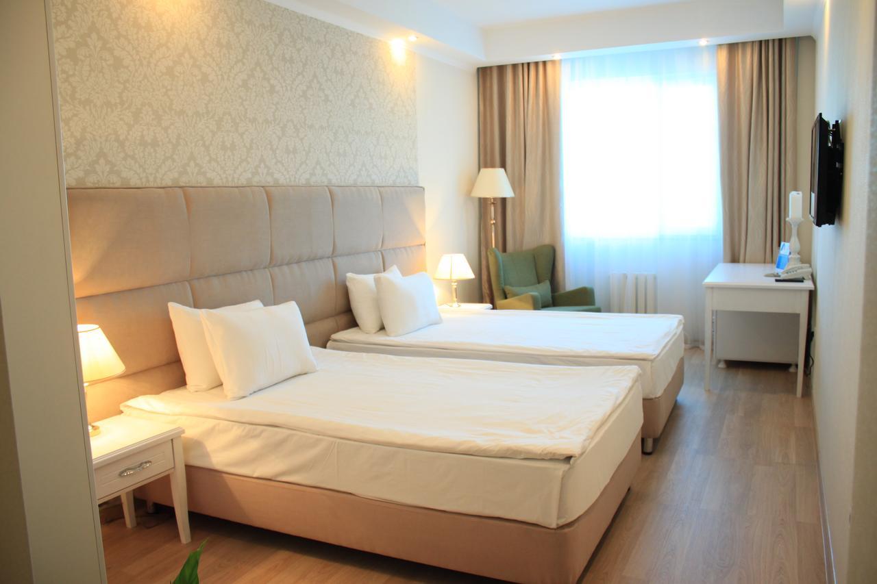 Akbulak Hotel Astana Luaran gambar
